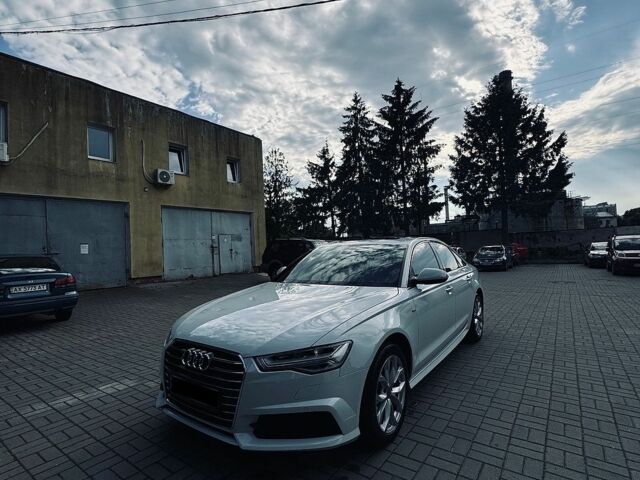 Білий Ауді А6, об'ємом двигуна 1.97 л та пробігом 67 тис. км за 21400 $, фото 1 на Automoto.ua