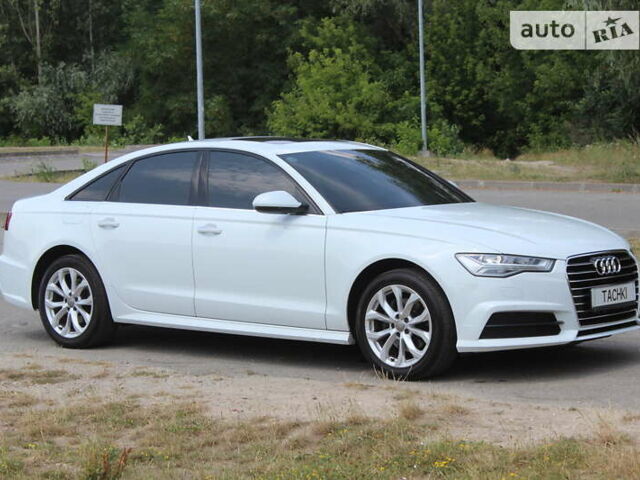 Білий Ауді А6, об'ємом двигуна 1.97 л та пробігом 90 тис. км за 27999 $, фото 1 на Automoto.ua