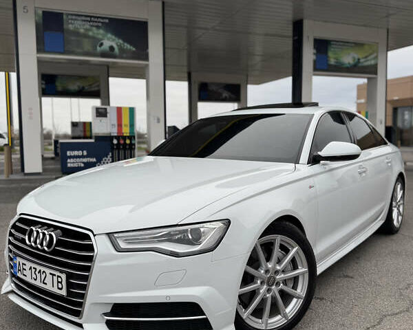 Белый Ауди А6, объемом двигателя 1.98 л и пробегом 122 тыс. км за 19500 $, фото 1 на Automoto.ua