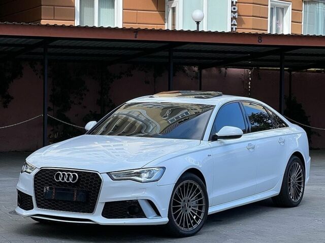 Білий Ауді А6, об'ємом двигуна 1.98 л та пробігом 127 тис. км за 18500 $, фото 1 на Automoto.ua