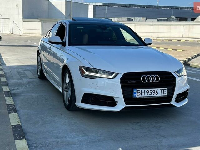 Білий Ауді А6, об'ємом двигуна 1.98 л та пробігом 79 тис. км за 24100 $, фото 1 на Automoto.ua