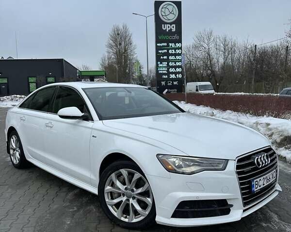 Білий Ауді А6, об'ємом двигуна 1.98 л та пробігом 158 тис. км за 16950 $, фото 1 на Automoto.ua