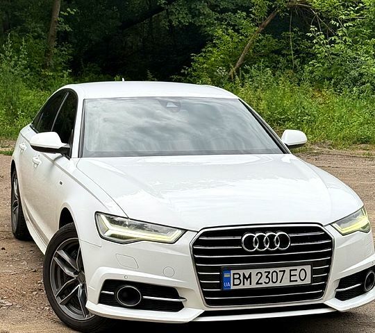 Білий Ауді А6, об'ємом двигуна 2 л та пробігом 230 тис. км за 18500 $, фото 1 на Automoto.ua