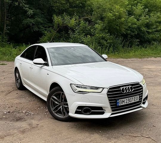 Белый Ауди А6, объемом двигателя 1.98 л и пробегом 230 тыс. км за 18500 $, фото 1 на Automoto.ua