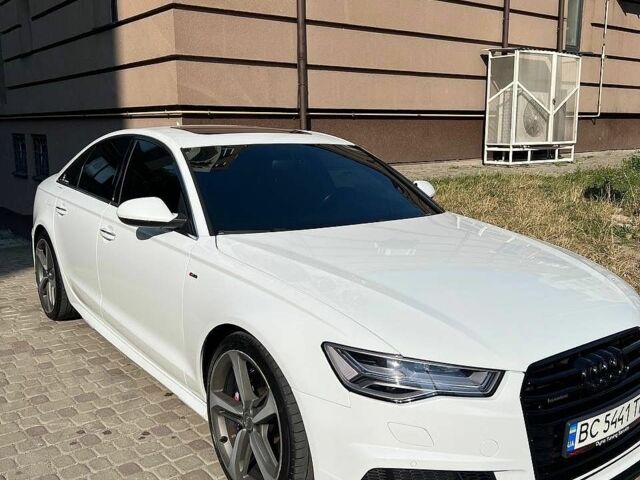Білий Ауді А6, об'ємом двигуна 1.98 л та пробігом 148 тис. км за 20000 $, фото 1 на Automoto.ua