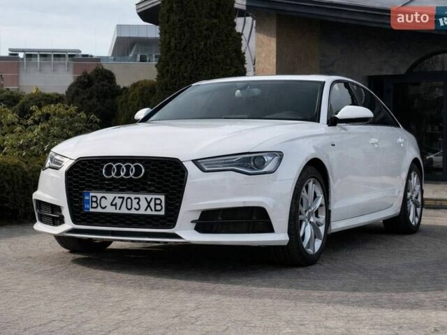 Белый Ауди А6, объемом двигателя 2 л и пробегом 141 тыс. км за 15900 $, фото 1 на Automoto.ua