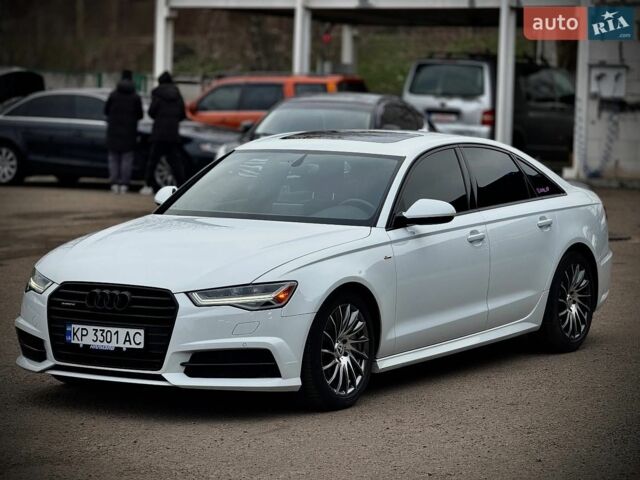 Білий Ауді А6, об'ємом двигуна 1.98 л та пробігом 99 тис. км за 17800 $, фото 1 на Automoto.ua