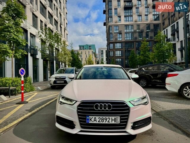 Білий Ауді А6, об'ємом двигуна 1.97 л та пробігом 106 тис. км за 24300 $, фото 1 на Automoto.ua