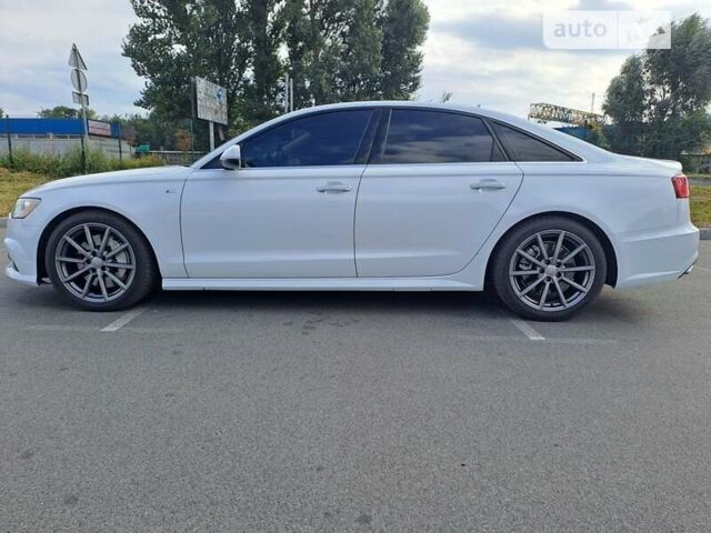 Білий Ауді А6, об'ємом двигуна 1.98 л та пробігом 130 тис. км за 21000 $, фото 1 на Automoto.ua