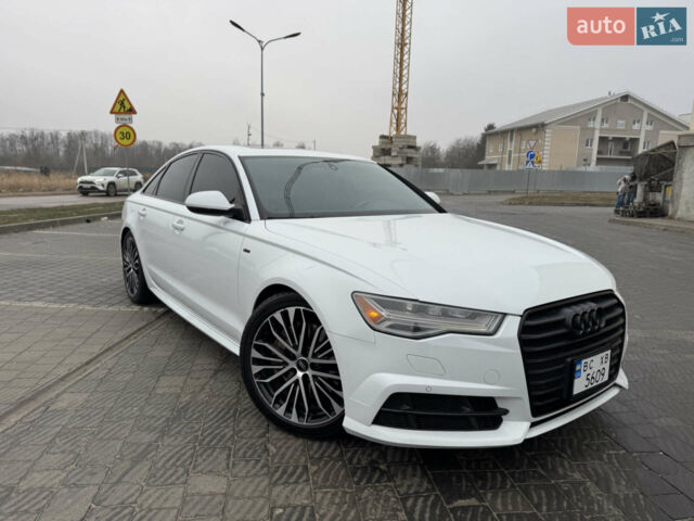 Білий Ауді А6, об'ємом двигуна 1.98 л та пробігом 197 тис. км за 19750 $, фото 1 на Automoto.ua