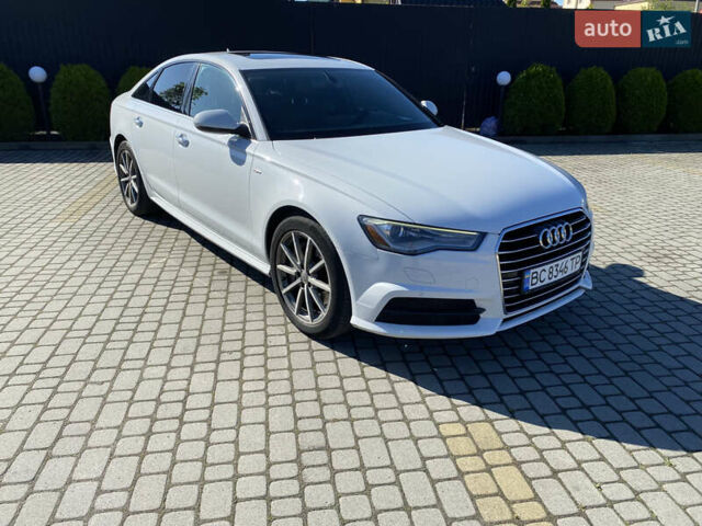 Белый Ауди А6, объемом двигателя 1.98 л и пробегом 150 тыс. км за 18500 $, фото 1 на Automoto.ua