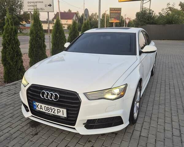 Белый Ауди А6, объемом двигателя 1.98 л и пробегом 205 тыс. км за 18500 $, фото 1 на Automoto.ua