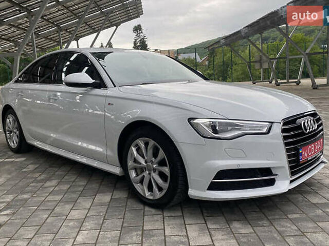 Белый Ауди А6, объемом двигателя 1.98 л и пробегом 73 тыс. км за 17300 $, фото 1 на Automoto.ua