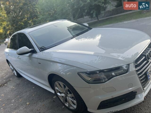 Белый Ауди А6, объемом двигателя 1.98 л и пробегом 34 тыс. км за 28000 $, фото 1 на Automoto.ua