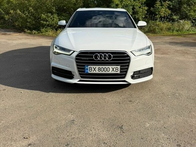 Белый Ауди А6, объемом двигателя 2 л и пробегом 225 тыс. км за 25600 $, фото 1 на Automoto.ua