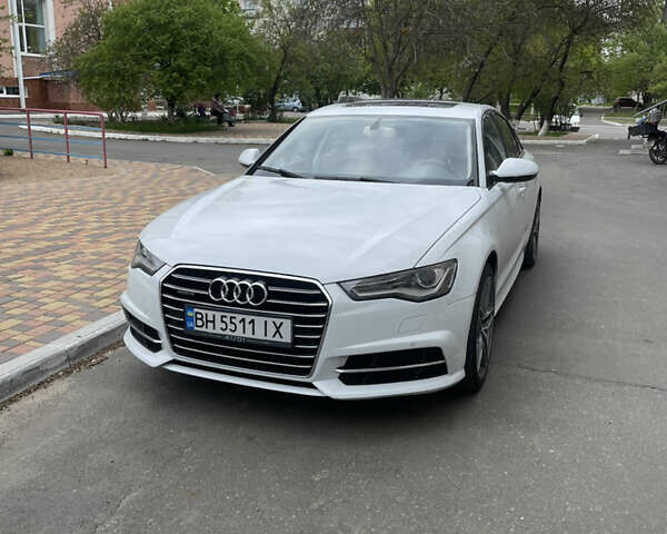 Білий Ауді А6, об'ємом двигуна 1.98 л та пробігом 126 тис. км за 19500 $, фото 1 на Automoto.ua