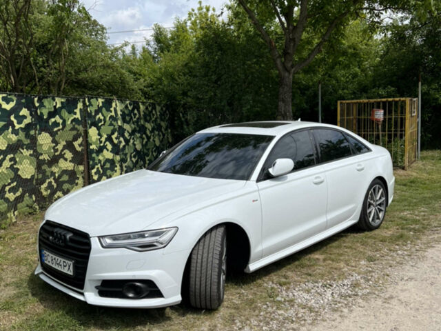 Белый Ауди А6, объемом двигателя 2 л и пробегом 130 тыс. км за 29000 $, фото 1 на Automoto.ua