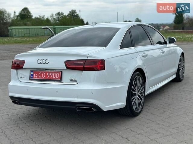 Белый Ауди А6, объемом двигателя 3 л и пробегом 128 тыс. км за 19499 $, фото 1 на Automoto.ua