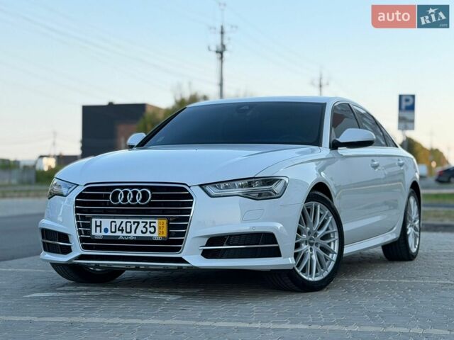 Белый Ауди А6, объемом двигателя 2 л и пробегом 52 тыс. км за 25777 $, фото 1 на Automoto.ua