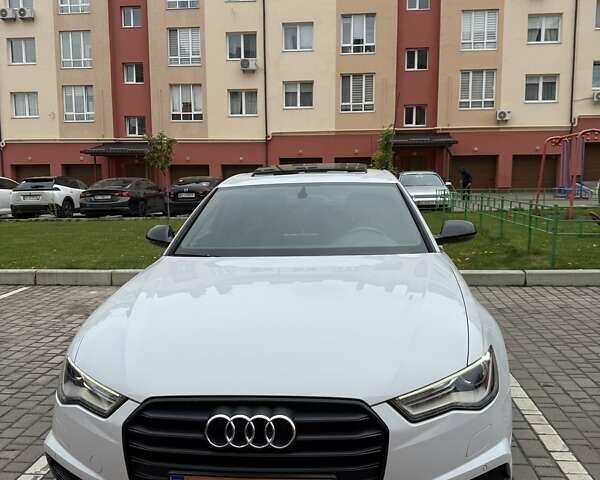 Білий Ауді А6, об'ємом двигуна 2 л та пробігом 92 тис. км за 25555 $, фото 1 на Automoto.ua