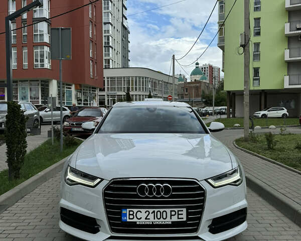 Білий Ауді А6, об'ємом двигуна 1.97 л та пробігом 141 тис. км за 28000 $, фото 1 на Automoto.ua