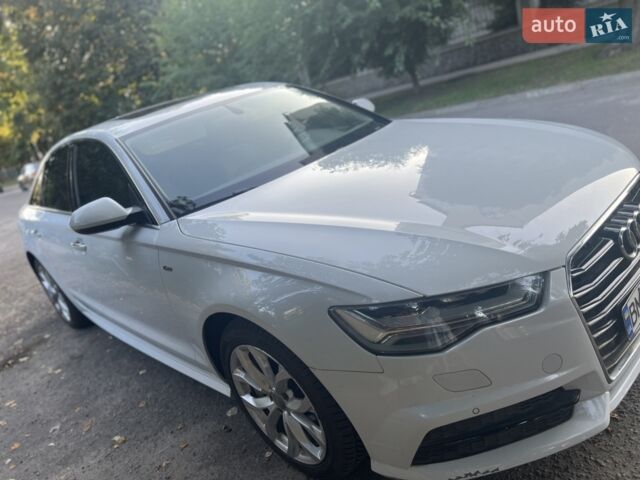 Білий Ауді А6, об'ємом двигуна 1.98 л та пробігом 34 тис. км за 28000 $, фото 1 на Automoto.ua