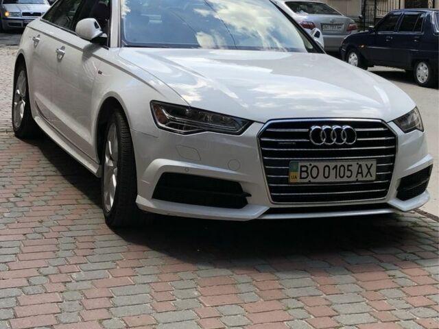 Белый Ауди А6, объемом двигателя 2 л и пробегом 70 тыс. км за 28100 $, фото 1 на Automoto.ua