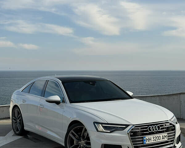 Білий Ауді А6, об'ємом двигуна 1.98 л та пробігом 83 тис. км за 33900 $, фото 1 на Automoto.ua