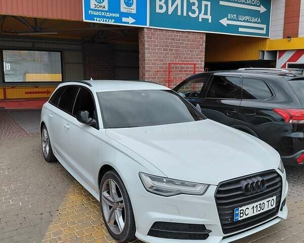 Білий Ауді А6, об'ємом двигуна 2 л та пробігом 265 тис. км за 22399 $, фото 1 на Automoto.ua