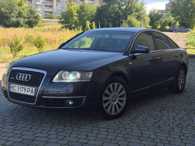 Чорний Ауді А6, об'ємом двигуна 3 л та пробігом 325 тис. км за 7211 $, фото 1 на Automoto.ua