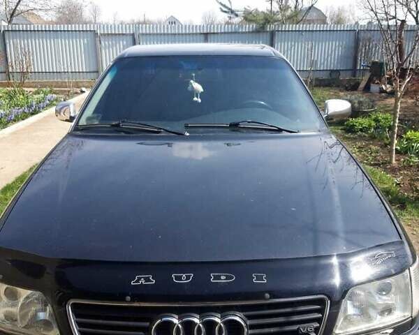 Черный Ауди А6, объемом двигателя 2.6 л и пробегом 400 тыс. км за 3400 $, фото 1 на Automoto.ua