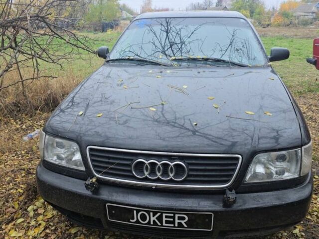 Черный Ауди А6, объемом двигателя 2.6 л и пробегом 250 тыс. км за 2381 $, фото 1 на Automoto.ua