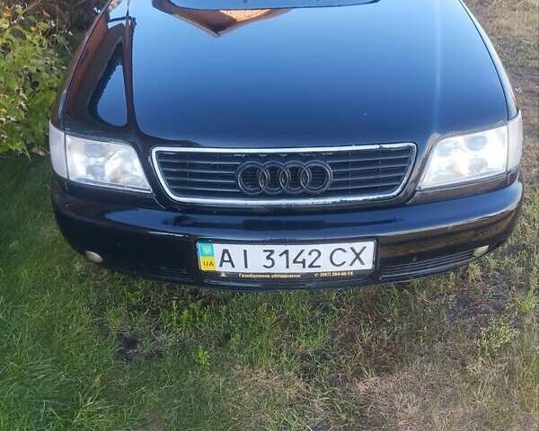 Черный Ауди А6, объемом двигателя 2.6 л и пробегом 500 тыс. км за 3200 $, фото 1 на Automoto.ua