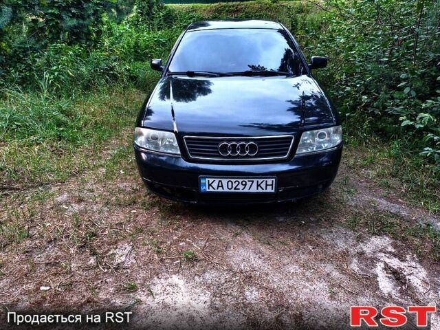 Черный Ауди А6, объемом двигателя 1.8 л и пробегом 300 тыс. км за 3600 $, фото 1 на Automoto.ua