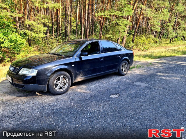 Чорний Ауді А6, об'ємом двигуна 2.4 л та пробігом 360 тис. км за 3900 $, фото 1 на Automoto.ua