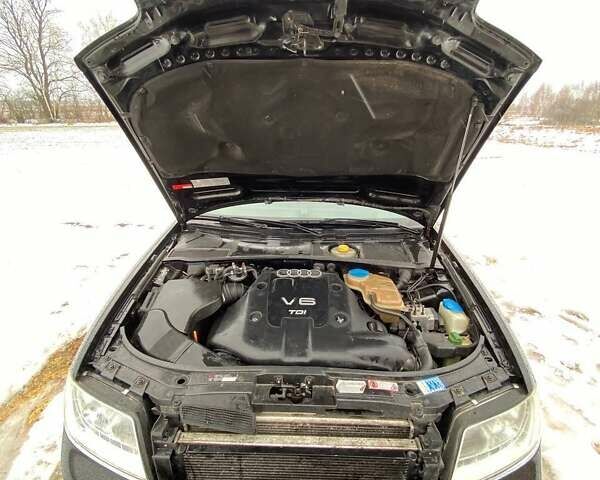 Черный Ауди А6, объемом двигателя 2.5 л и пробегом 350 тыс. км за 4000 $, фото 1 на Automoto.ua