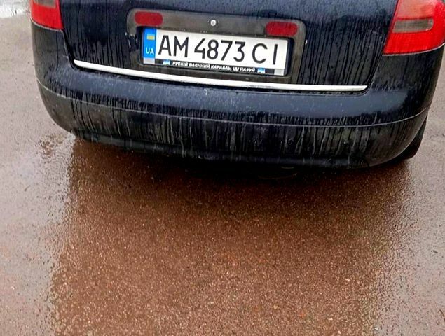 Черный Ауди А6, объемом двигателя 2.4 л и пробегом 400 тыс. км за 3300 $, фото 1 на Automoto.ua