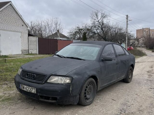 Черный Ауди А6, объемом двигателя 2.5 л и пробегом 300 тыс. км за 1450 $, фото 1 на Automoto.ua