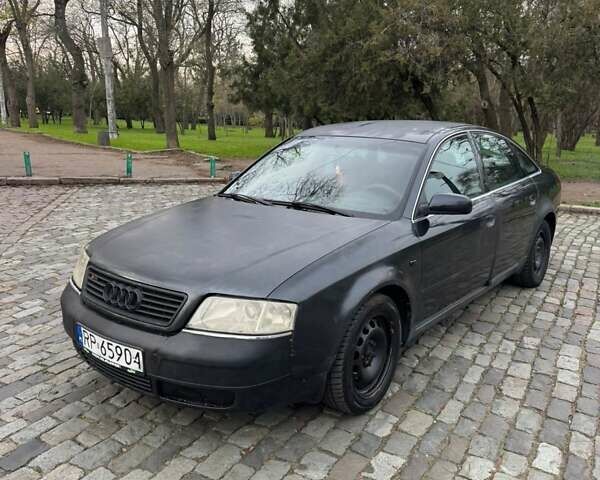 Черный Ауди А6, объемом двигателя 2.5 л и пробегом 337 тыс. км за 1499 $, фото 1 на Automoto.ua