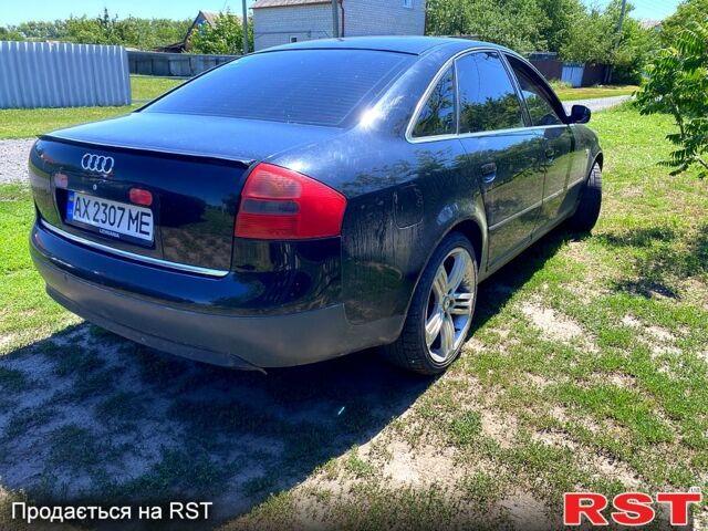 Черный Ауди А6, объемом двигателя 1.8 л и пробегом 340 тыс. км за 2600 $, фото 1 на Automoto.ua