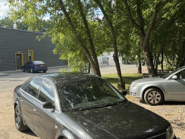 Черный Ауди А6, объемом двигателя 2.8 л и пробегом 394 тыс. км за 3800 $, фото 1 на Automoto.ua