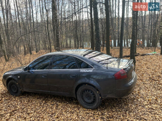 Черный Ауди А6, объемом двигателя 2.4 л и пробегом 390 тыс. км за 3600 $, фото 1 на Automoto.ua