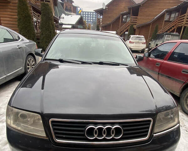 Черный Ауди А6, объемом двигателя 2.39 л и пробегом 400 тыс. км за 3000 $, фото 1 на Automoto.ua