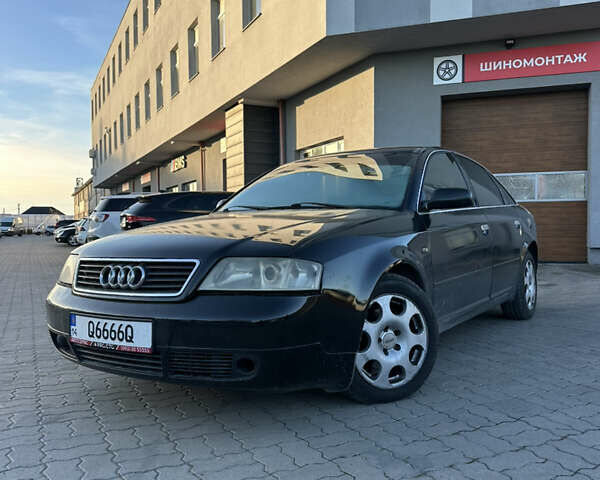 Черный Ауди А6, объемом двигателя 1.78 л и пробегом 327 тыс. км за 3800 $, фото 1 на Automoto.ua