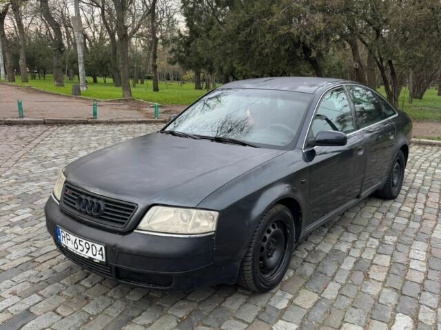 Черный Ауди А6, объемом двигателя 2.5 л и пробегом 337 тыс. км за 1499 $, фото 1 на Automoto.ua