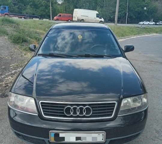 Черный Ауди А6, объемом двигателя 1.8 л и пробегом 406 тыс. км за 5600 $, фото 1 на Automoto.ua