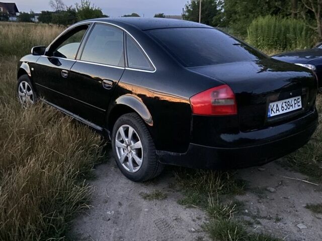 Черный Ауди А6, объемом двигателя 1.8 л и пробегом 300 тыс. км за 2800 $, фото 1 на Automoto.ua