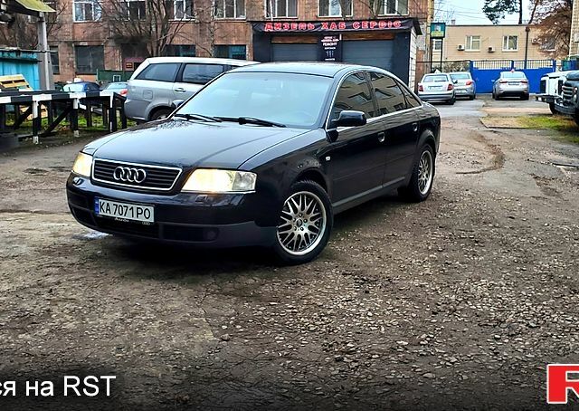 Черный Ауди А6, объемом двигателя 1.8 л и пробегом 366 тыс. км за 4999 $, фото 1 на Automoto.ua