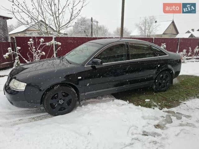 Черный Ауди А6, объемом двигателя 1.9 л и пробегом 167 тыс. км за 5500 $, фото 1 на Automoto.ua