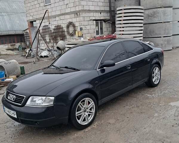 Черный Ауди А6, объемом двигателя 2.4 л и пробегом 430 тыс. км за 4500 $, фото 1 на Automoto.ua